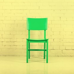 Green chair - interview concept. Toned image