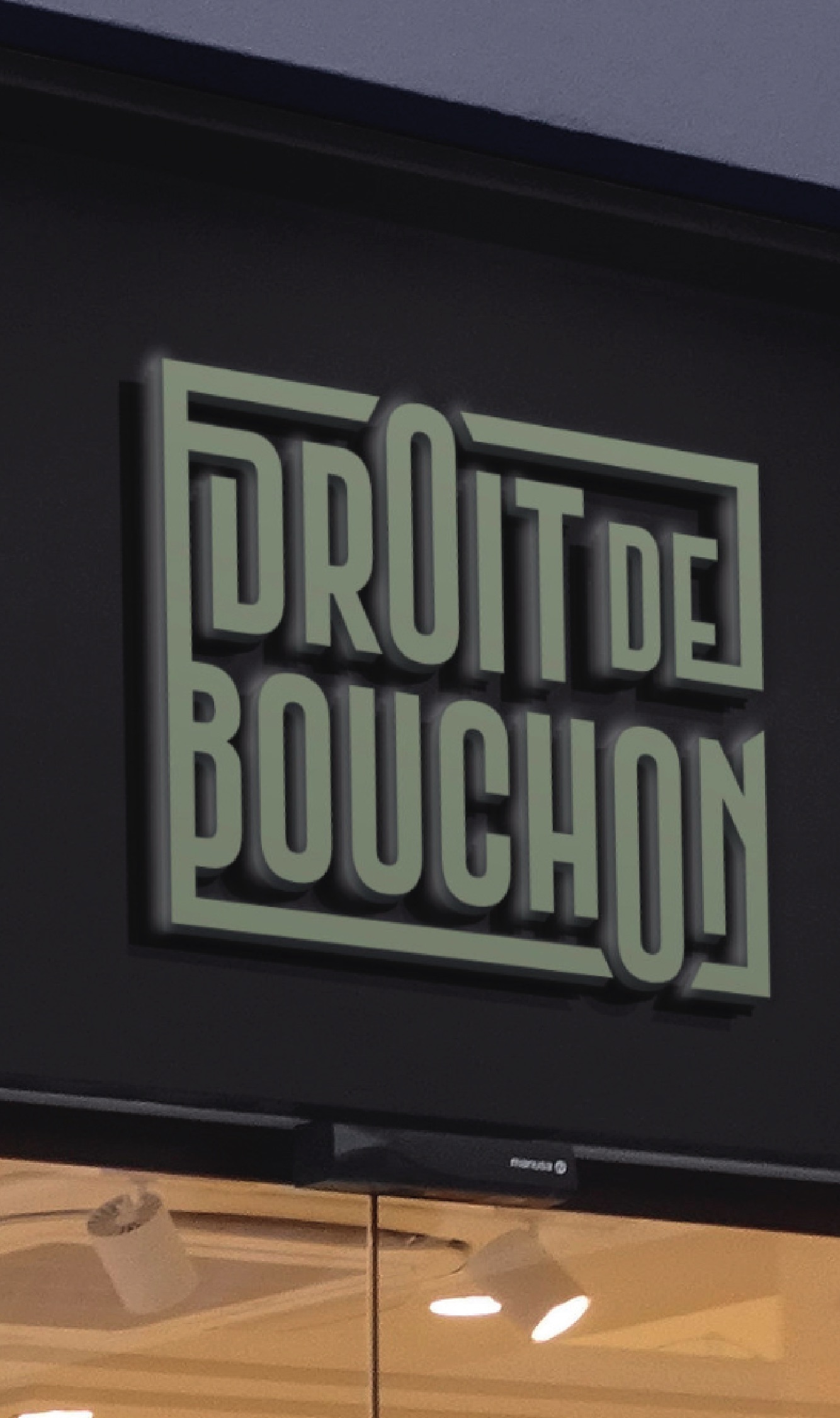 Le logo en 3D sur le mur