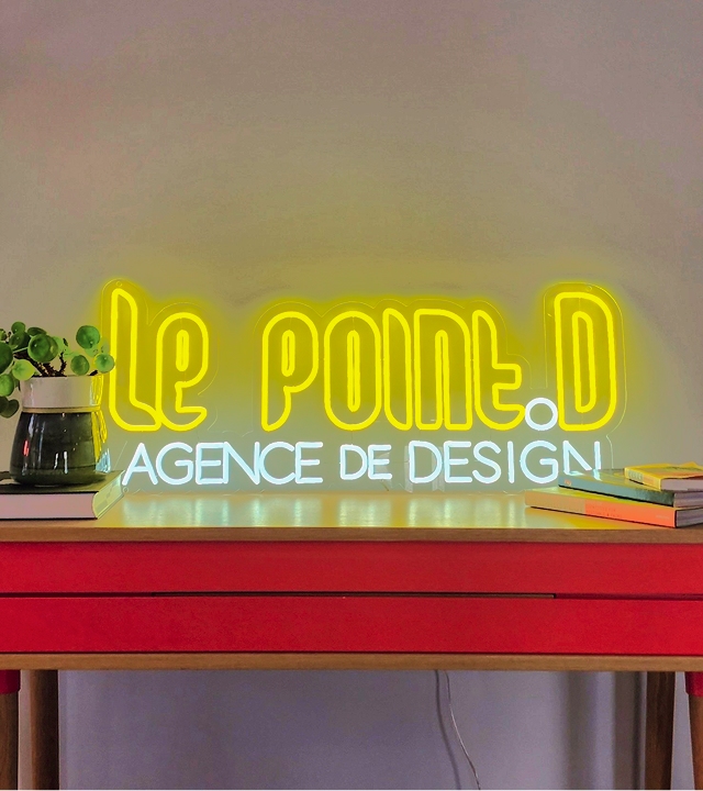Application du logo Le point D sur un néon