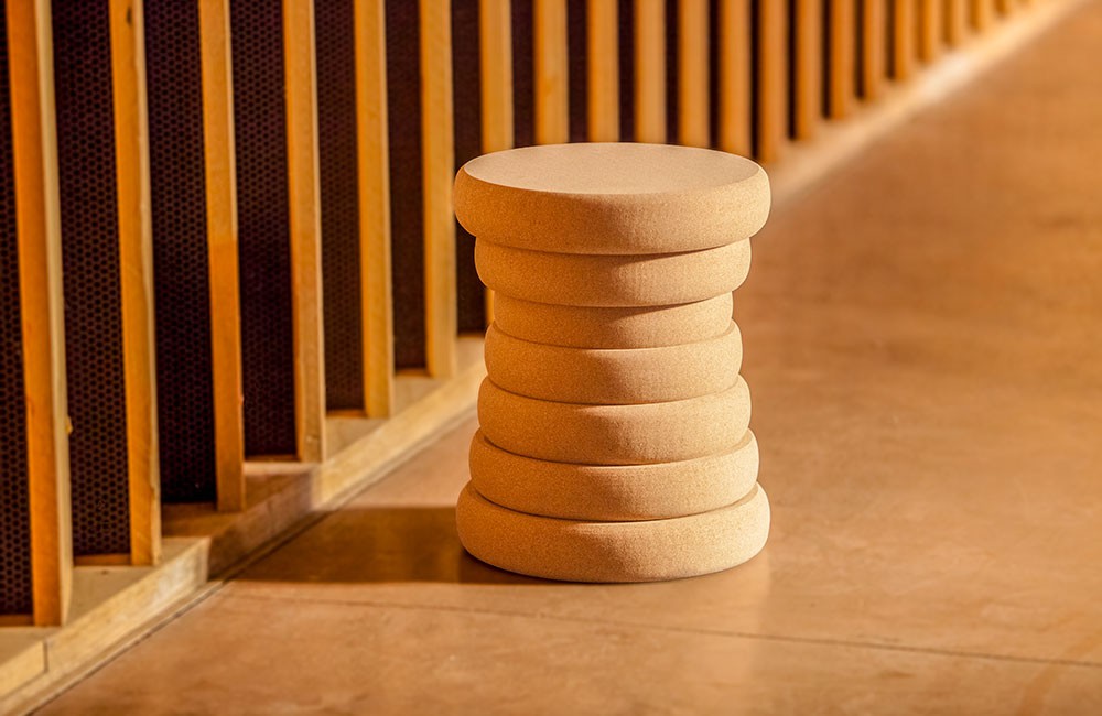 It looks like a wood carving which make it a beautiful and modern stool